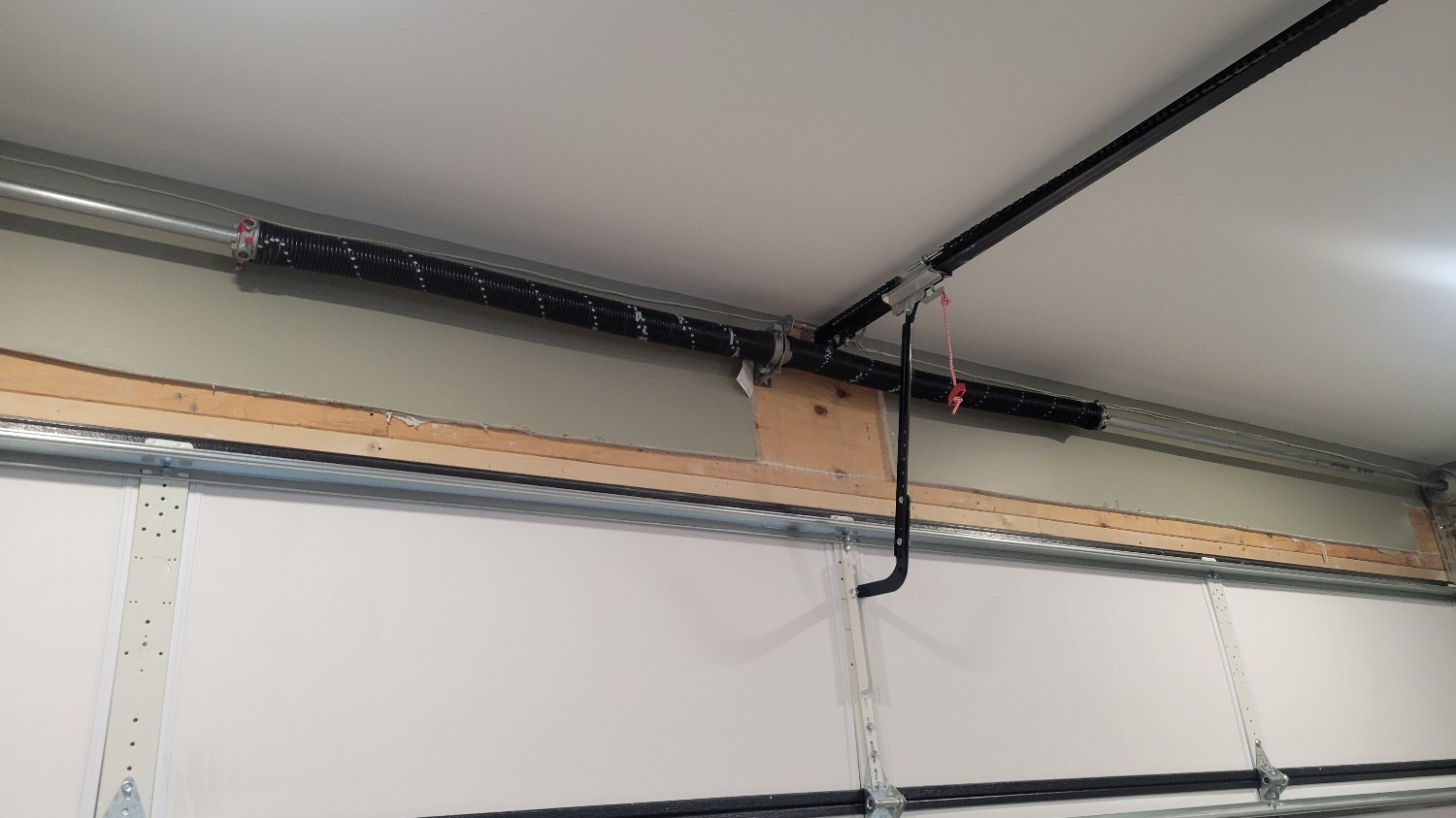 Residential garage door torsion spring repair