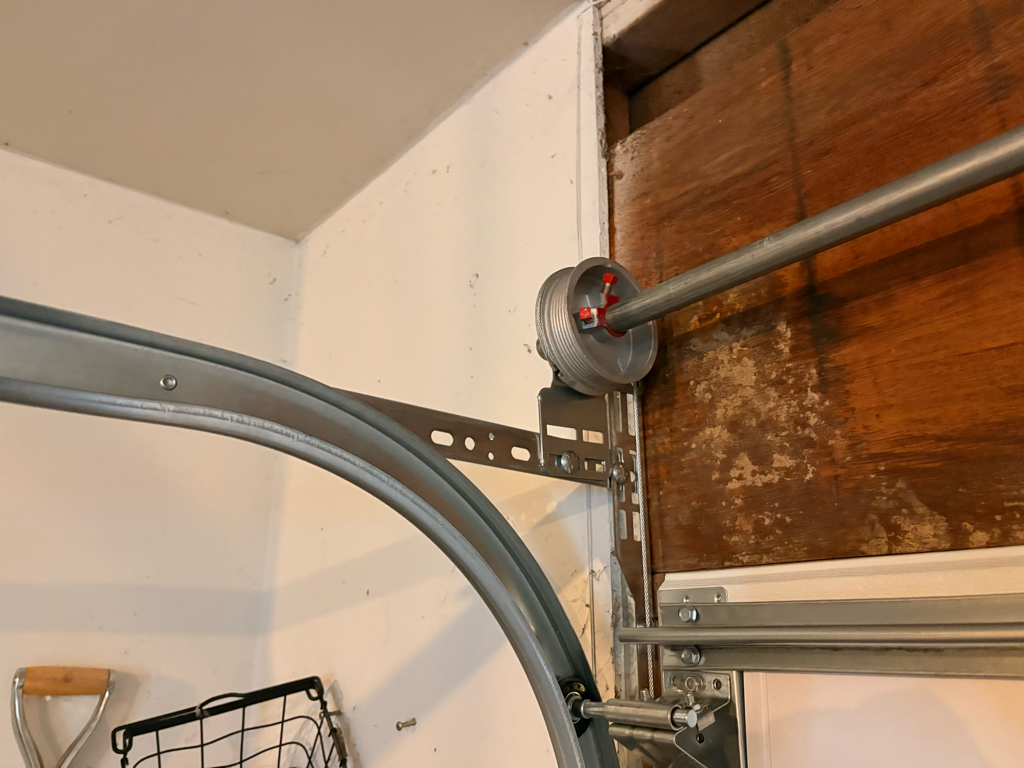Residential garage door torsion cable repair