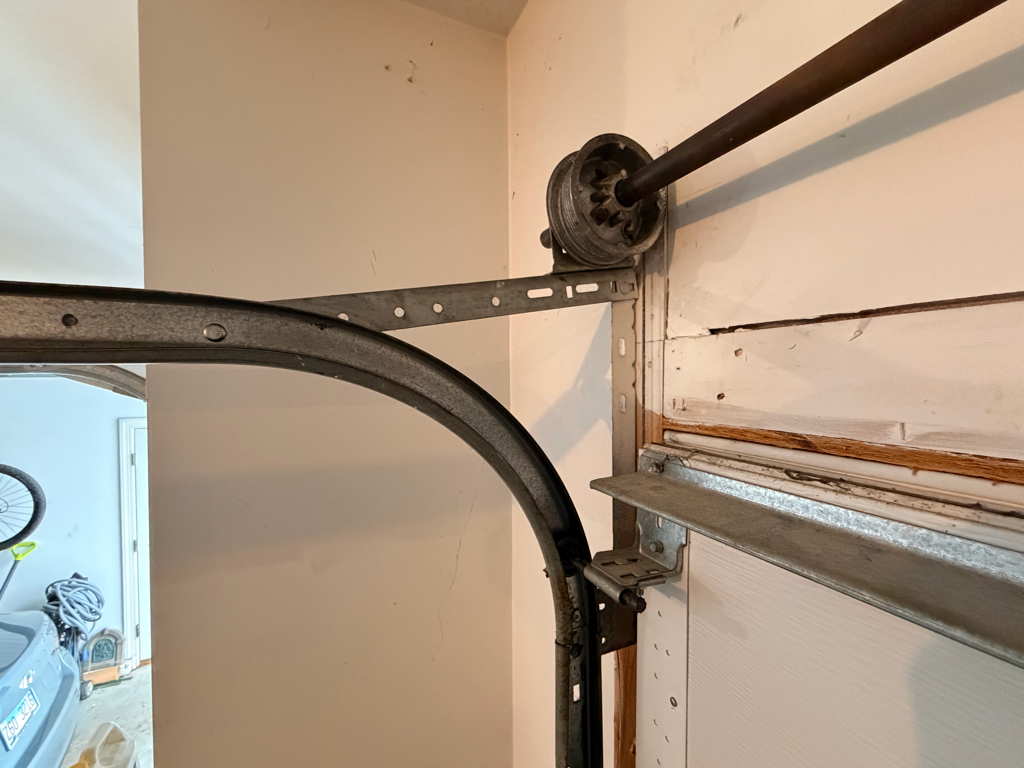 Interior view of a garage door with a  cable system.