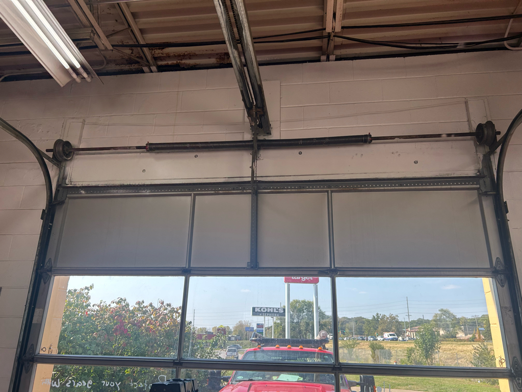 commercial garage door with torsion spring and track system