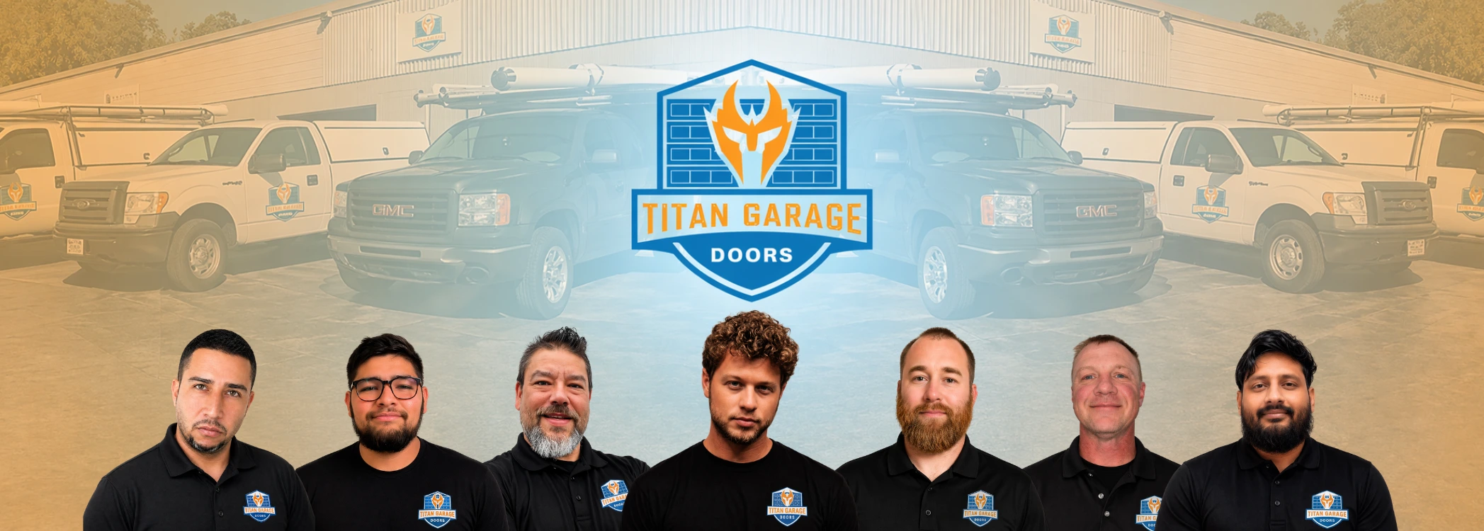 Team of professional garage door technicians from Titan Garage Doors Quad Cities standing in front of branded service trucks and warehouse building.